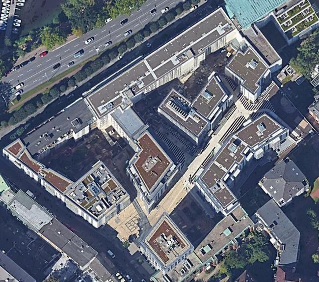 Moderne Architektur des Alstercampus, 2. Bauabschnitt in Hamburg, mit grünen Flächen und urbanem Umfeld.